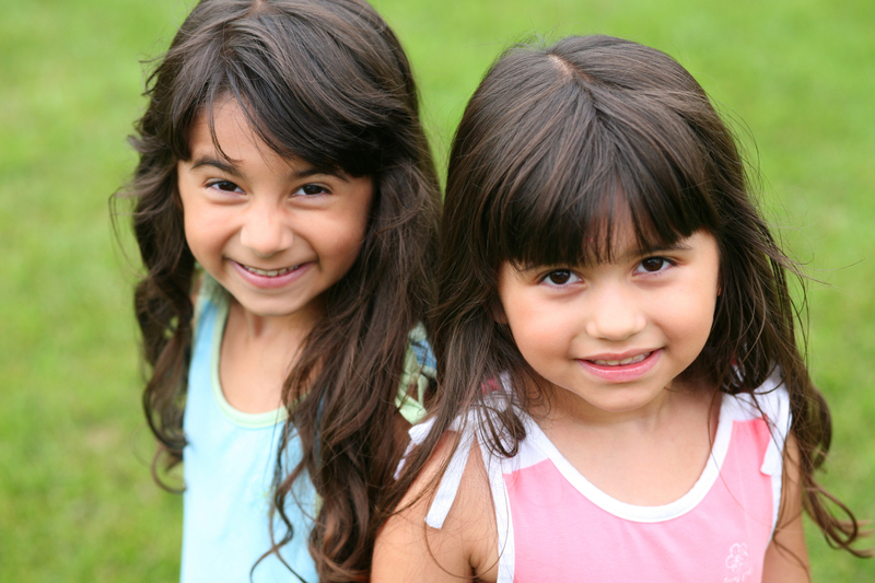 Two smiling children featured on the original Parsons Center homepage