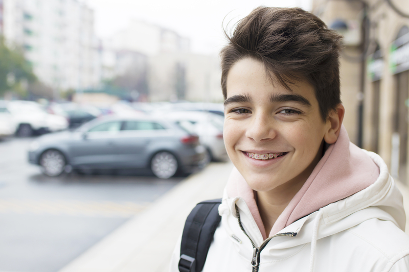 A smiling young Parsons Center patient